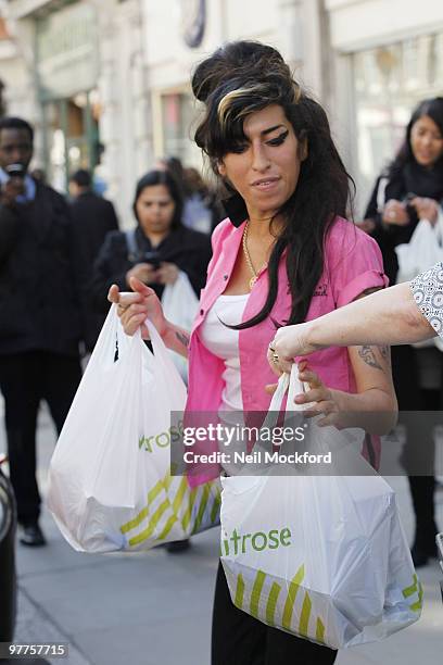 Amy Winehouse is sighted shopping at her local supermarket on March 16, 2010 in London, England.