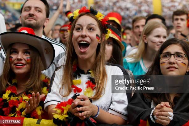 German fans enjoy the match, and shout towards the screen. 15,000 fans came to the Commerzbank Arena in Frankfurt, to watch Mexico beat Germany by 1...