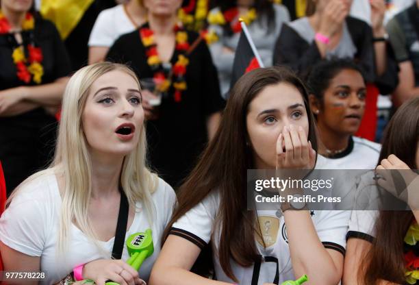 German fans watch the match anxiously. 15,000 fans came to the Commerzbank Arena in Frankfurt, to watch Mexico beat Germany by 1 goal to nil in the...