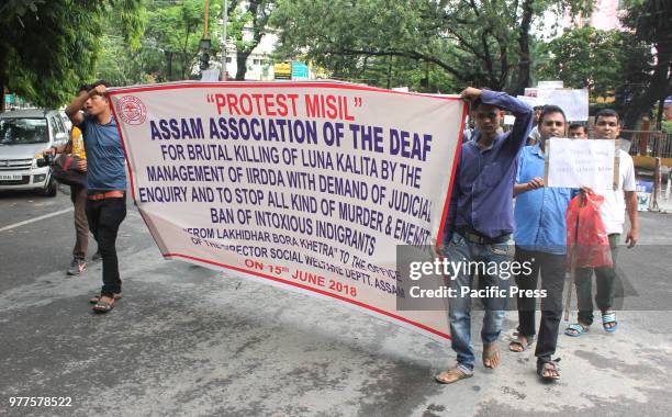 Member of Assam Association of Deaf taking out a rally demanding judicial inquiry of brutal killing of Luna Kalita and to stop all kind of murder and...