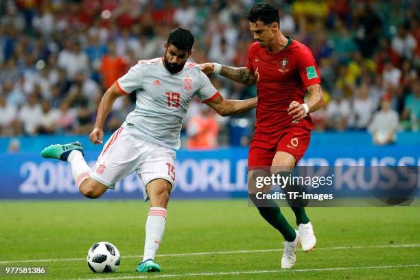 Jose Fonte of Portugal and Diego Costa of Spain battle for the ball during the 2018 FIFA World Cup Russia group B match between Portugal and Spain at...