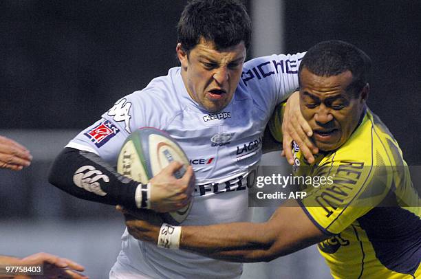 Bayonne's N°12 Lionel Mazars vies with Montferrand Seremaia Bai, during the French Top 14 rugby union match, Bayonne vs Montferrand on March 12, 2010...