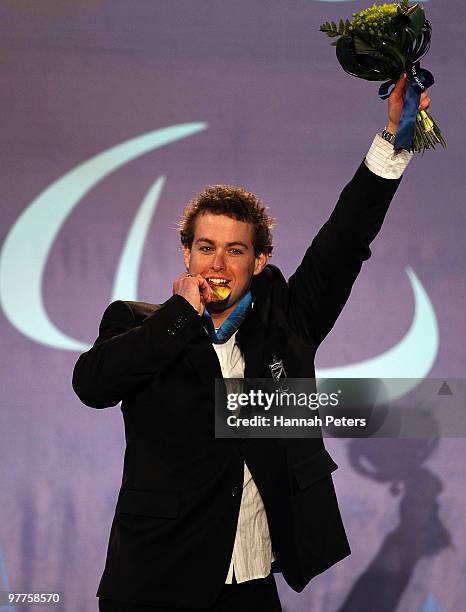 Gold medalist Adam Hall of New Zealand celebrates during the medal ceremony for the Men's Standing Slalom on Day 4 of the 2010 Vancouver Winter...