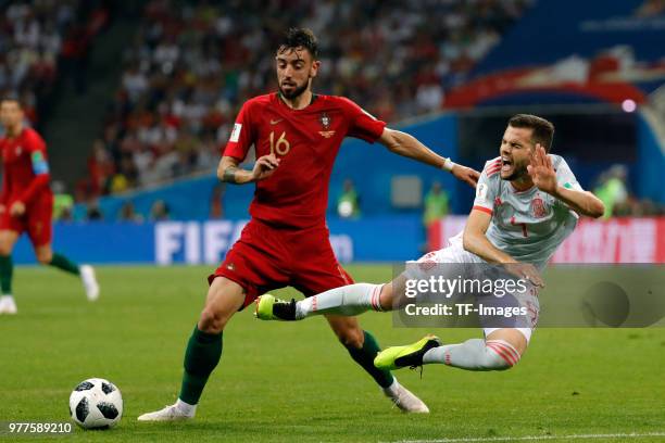 Bruno Fernandes of Portugal and Nacho Fernandez of Spain battle for the ball during the 2018 FIFA World Cup Russia group B match between Portugal and...