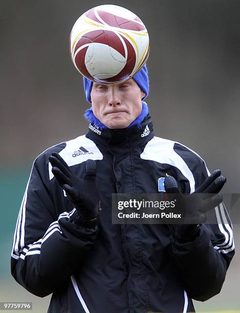 Marcell Jansen of Hamburg plays the ball during the Hamburger SV training session at the HSH Nordbank Arena on March 16, 2010 in Hamburg, Germany.