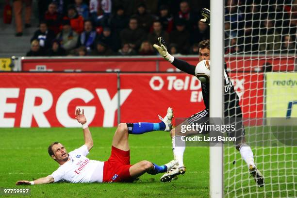 David Rozehnal of Hamburg scores his teams second goal pas goalkeeper Rene Adler of Leverkusen during the Bundesliga match between Bayer Leverkusen...