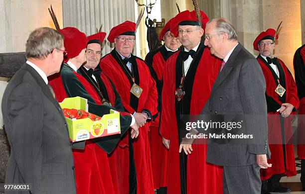 King Albert II of Belgium meets members of the strawberry producers association at Laeken Castle on March 16, 2010 in Brussels, Belgium.