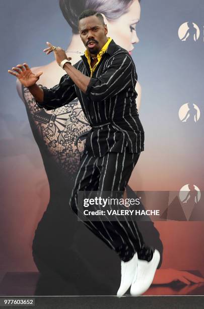 Actor Colman Domingo jumps during a photocall for the TV show "Fear the walking dead" as part of the 58th Monte-Carlo Television Festival on June 18,...