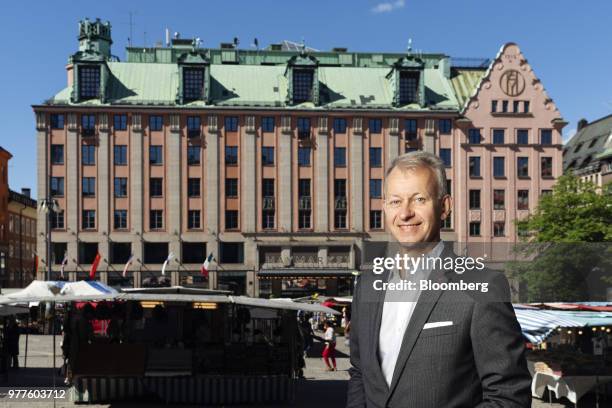 Even Frydenberg, chief executive officer of Scandic Hotels Group AB, poses for a photograph in front of the Haymarket By Scandic Hotel, prior to an...