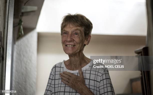 Australian nun Patricia Fox smiles inside her house in Manila on June 18, 2018. - An Australian nun ordered to leave the Philippines after angering...