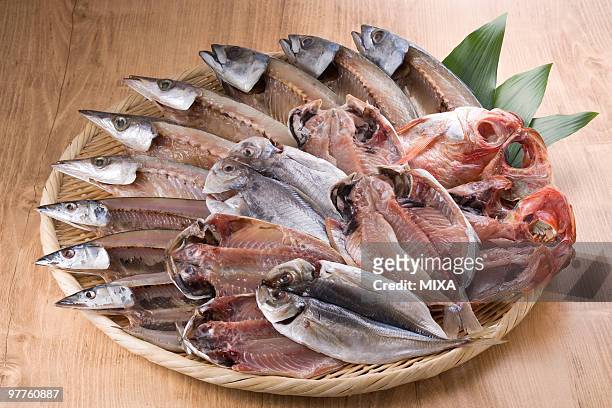 dried fish - saury stock pictures, royalty-free photos & images