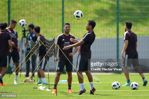 Giovani dos Santos of Mexico, heads the ball during a training session & Press conference at Training Base Novogorsk-Dynamo, on June 18, 2018 in...
