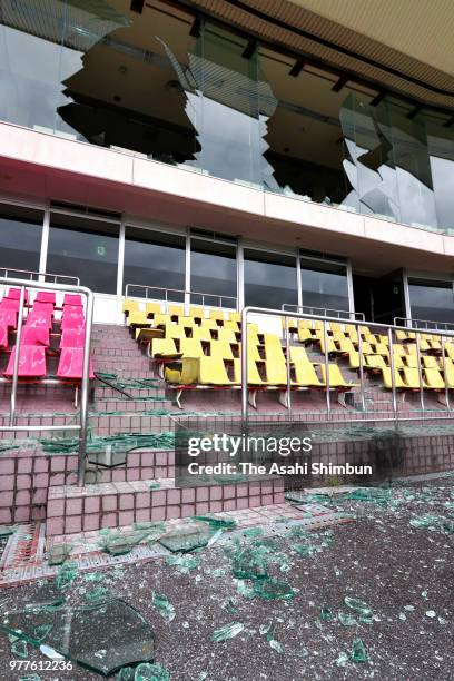 Broken glasses are scattered after the magnitude 6.1 earthquake at a Keirin Racecourse on June 18, 2018 in Muko, Kyoto, Japan. A powerful earthquake...