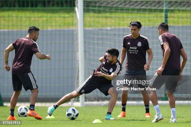 Marco Fabian, Oribe Peralta, Erick Gutierrez and Edson Alvarez of Mexico, struggles for the ball during a training session & Press conference at...