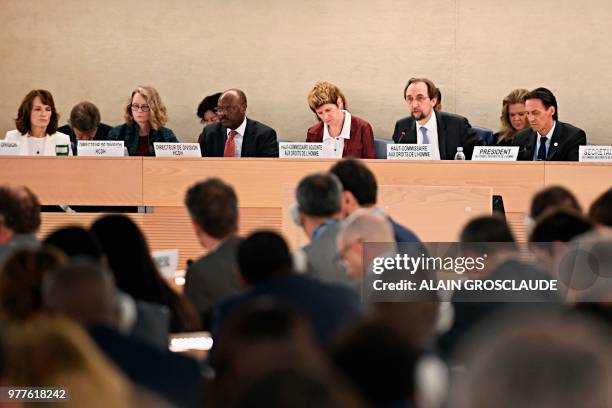 United Nations High Commissioner for Human Rights Zeid Ra'ad Al Hussein flanked by President of the Human Rights Council Vojislav Suc speaks during...