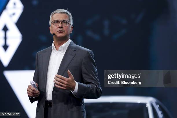 Rupert Stadler, chief executive officer of Audi AG, speaks as he unveils the Audi AG A8 sedan automobile during a launch event in Barcelona, Spain,...