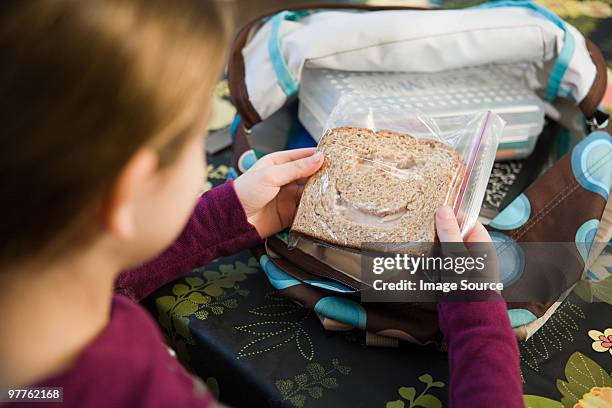girl with a sandwich - lunch bag stock pictures, royalty-free photos & images