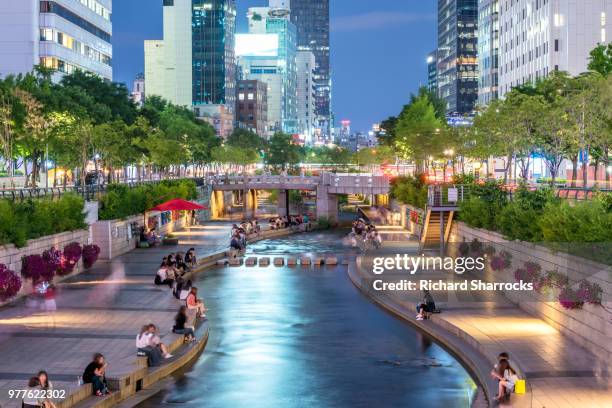 cheonggyecheon stream sunset, seoul, south korea - seoul stock pictures, royalty-free photos & images