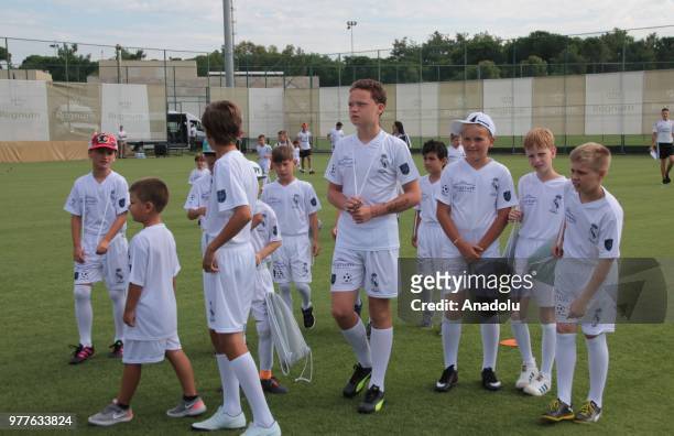 Children gather at a football field for their training within a football academy programme by 'Real Madrid Foundation Clinic Turkey' that will be...