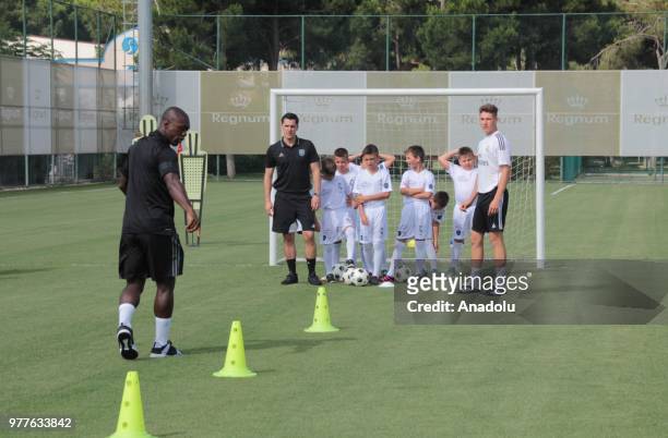 Former Dutch midfielder Clarence Seedorf attends the opening of a football academy 'Real Madrid Foundation Clinic Turkey' that will be held between...