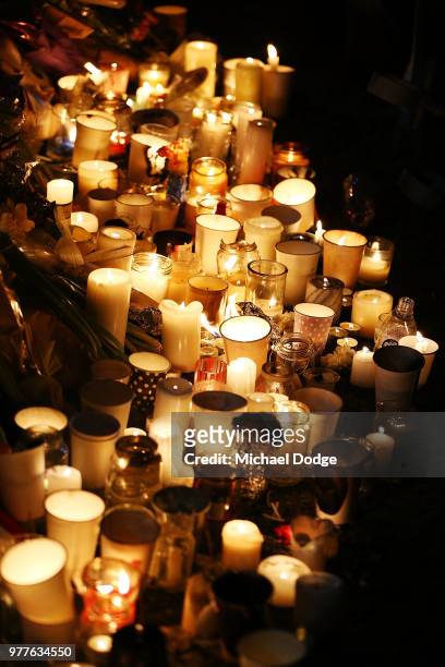 Candles are seen during a vigil held in memory of murdered Melbourne comedian, 22-year-old Eurydice Dixon, at Princess Park on June 18, 2018 in...