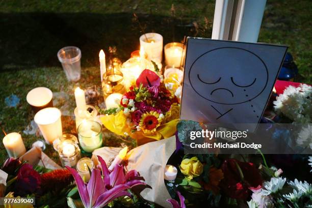 Candles are seen during a vigil held in memory of murdered Melbourne comedian, 22-year-old Eurydice Dixon, at Princess Park on June 18, 2018 in...