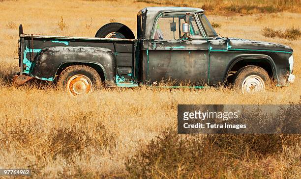 vintage pickup truck in field - vehicle breakdown ストックフォトと画像