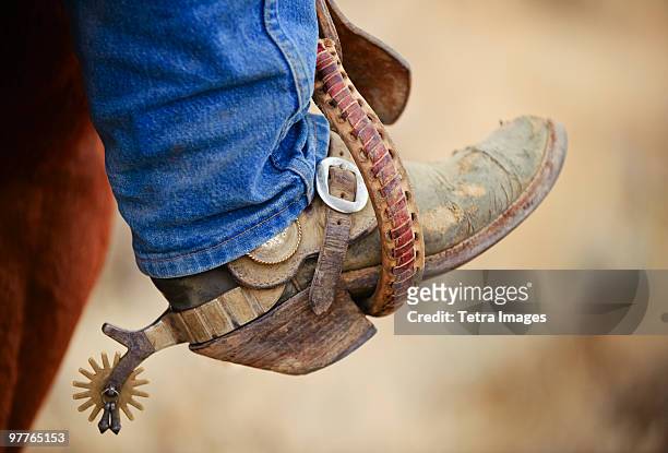 cowboy boot with spur - stirrup stock pictures, royalty-free photos & images