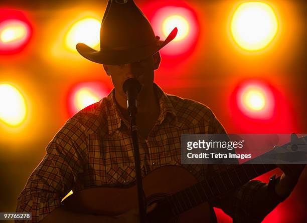country singer - country and western music stock pictures, royalty-free photos & images