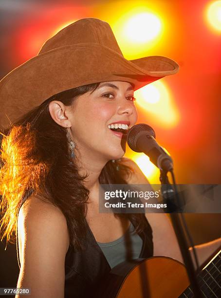 country singer - country and western music stock pictures, royalty-free photos & images