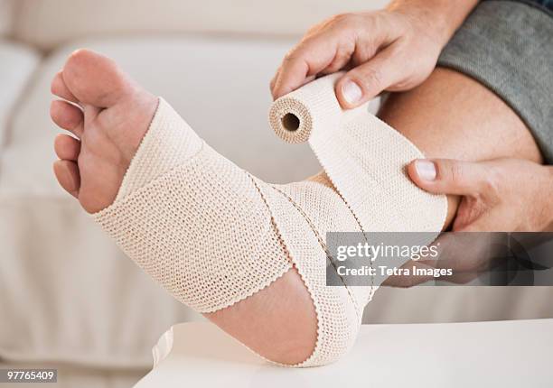 injured foot - sprain stock pictures, royalty-free photos & images
