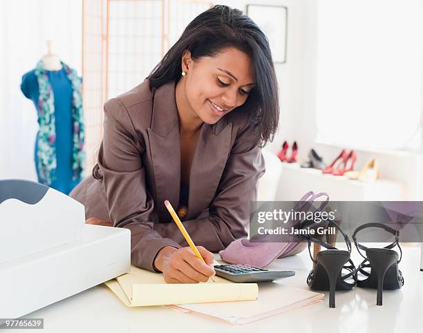 woman in shoe store - long receipt stock pictures, royalty-free photos & images