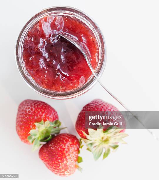 jar of strawberry jam - strawberry jam stock pictures, royalty-free photos & images