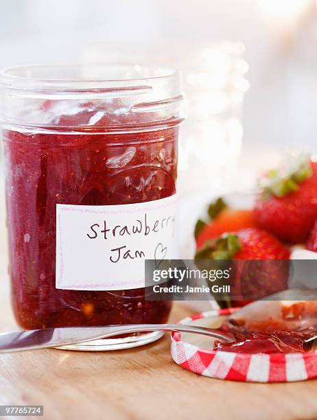 jar of strawberry jam - strawberry jam stock pictures, royalty-free photos & images