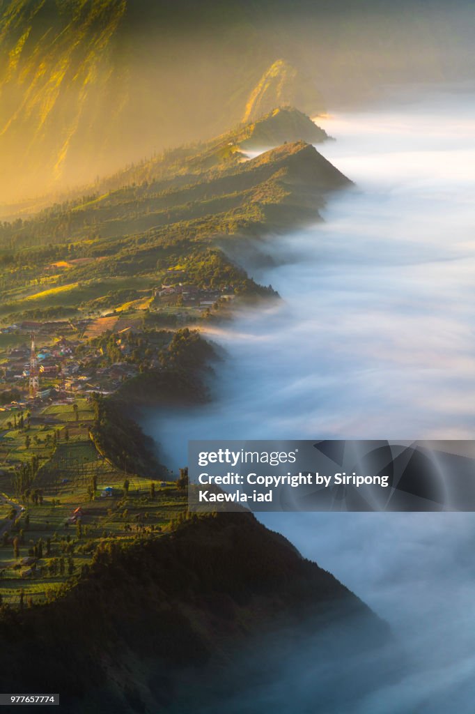 The sea of fog during sunrise at Cemoro Lawang, East Java, Indonesia.
