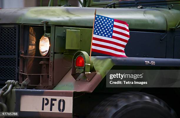 american flag on jeep - military vehicle stock pictures, royalty-free photos & images