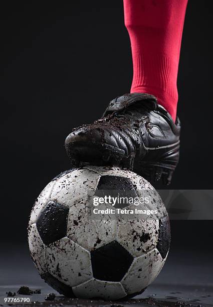 soccer player - football boots stock-fotos und bilder