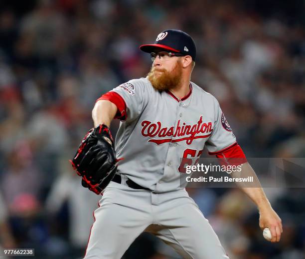 Pitcher Sean Doolittle of the Washington Nationals pitches in relief during an interleague MLB baseball game against the New York Yankees on June 13,...