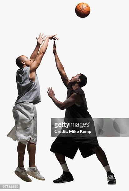 two basketball players - blocking sports activity stock pictures, royalty-free photos & images