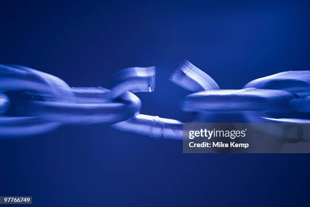 broken link in chain - broken chain stock pictures, royalty-free photos & images