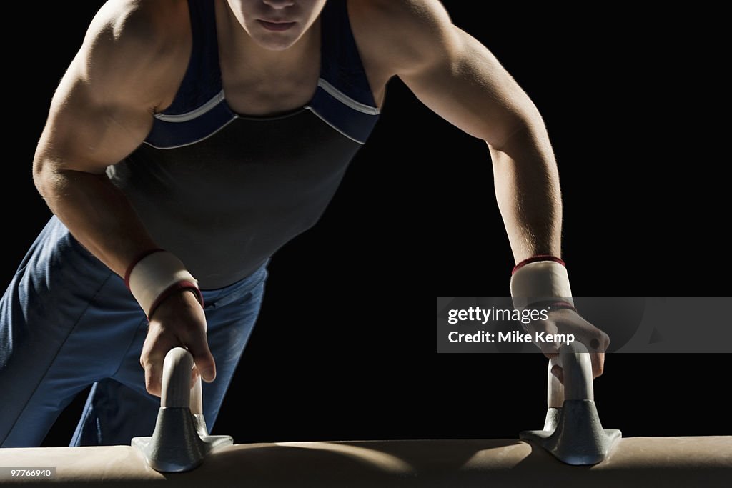 Gymnast on pommel horse