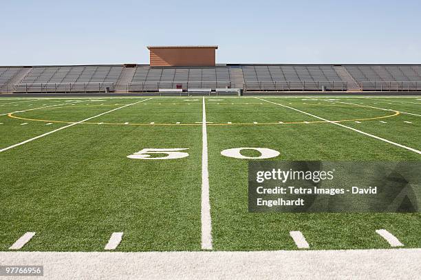 football field and stadium - campo de fútbol americano fotografías e imágenes de stock