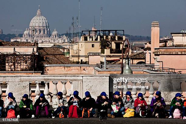 Class of students takes a lunch break in Rome, Italy, on Monday, March 15, 2010. Italy's economy shrank more than originally estimated in the fourth...