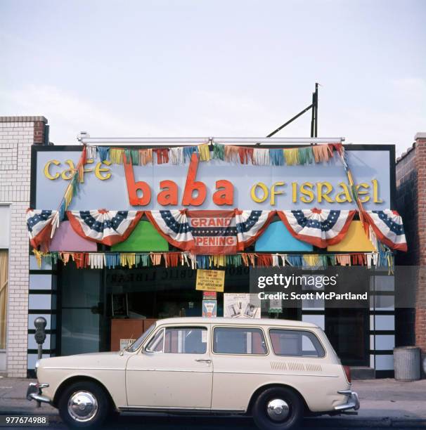 New York City - Exterior shot of the Cafe Baba of Isreal, which advertises it's 'Grand Opening,' Queens, New York.