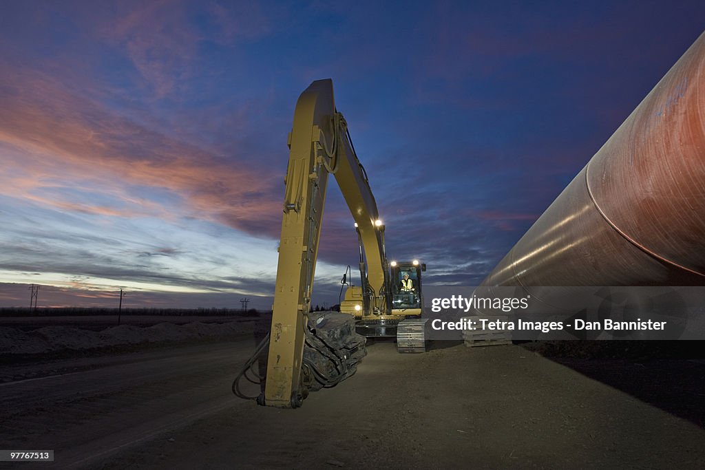 Heavy equipment beside pipeline