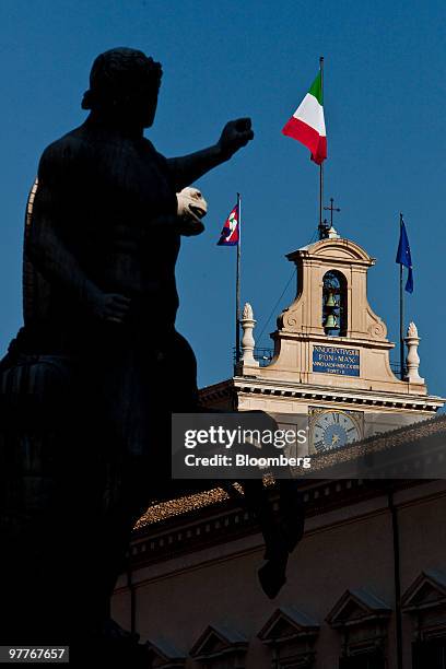 The Italian national flag flies atop the Palazzo Quirinale, the official residence of Italy's president, in Rome, Italy, on Monday, March 15, 2010....