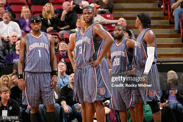 Stephen Jackson, Boris Diaw, Nazr Mohammed, Raymond Felton and Gerald Wallace of the Charlotte Bobcats stand on the court during the game against the...