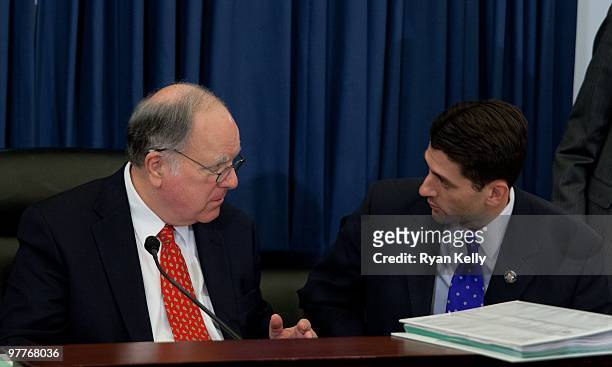 House Budget Committee Chairman John M. Spratt Jr., D-S.C., left, speaks to the panel's ranking Republican, Paul D. Ryan, R-Wis., prior to a meeting...