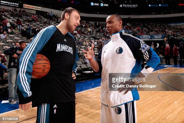 Oleksiy Pecherov of the Minnesota Timberwolves and Caron Butler of the Dallas Mavericks talk together before the game on March 3, 2010 at American...