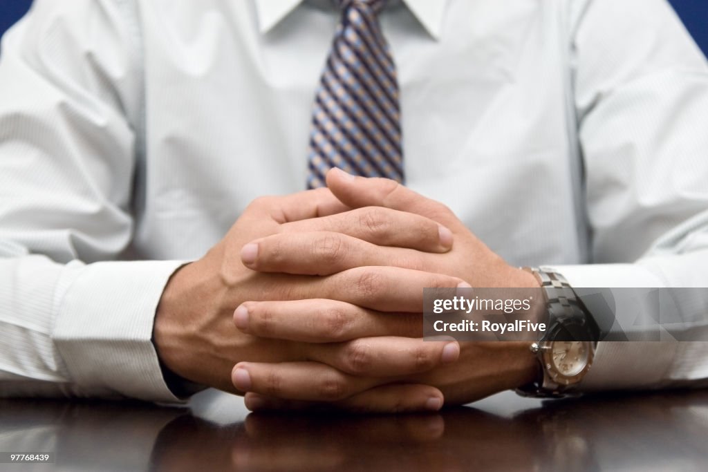 Waiting Hands Folded High-Res Stock Photo - Getty Images